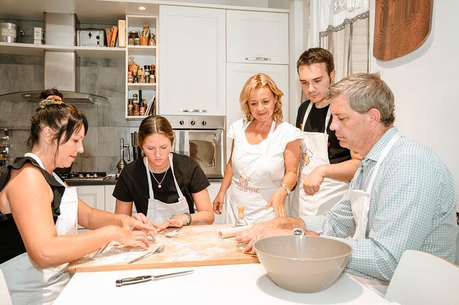 Cesarine: Market Tour & Cooking Class at Local's Home in Siena - Cooking at home: workstations, utensils, and a real rhythm