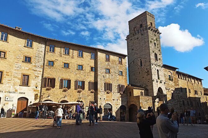 PRIVATE TOUR: Full-Day Volterra & San Gimignano with Wine Tasting Experience - San Gimignano in about an hour: towers, Vernaccia, and Gelateria Dondoli