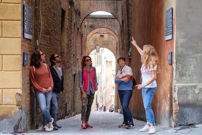 Siena Sightseeing Walking Tour with Food Tastings for Small Groups or Private - Basilica Cateriniana di San Domenico: Saint Catherine’s pull on Siena