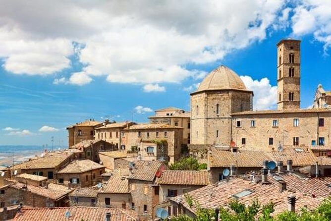 Small-Group San Gimignano and Volterra Day Trip from Siena - Lunch at a farm outside town: saffron dishes and Vernaccia
